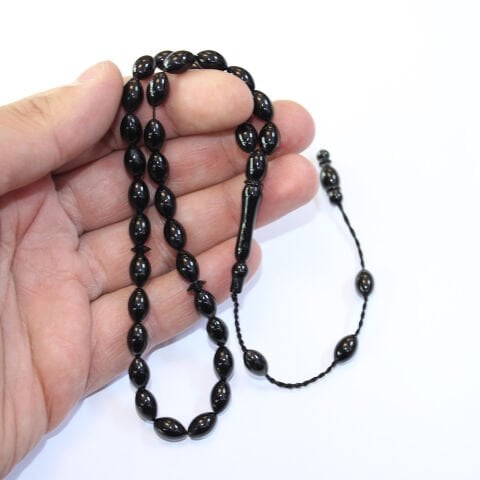 Sistem Püsküllü Oltu Taşı Tespih 6*9,5 (mm)