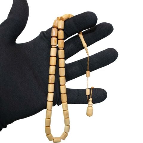 Usta İşçilikli Mamut Dişi Tespih 7*11 (mm)