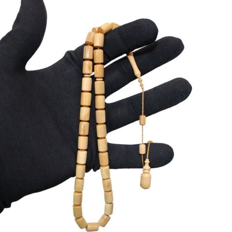 Usta İşçilikli Mamut Dişi Tespih 7*11 (mm)