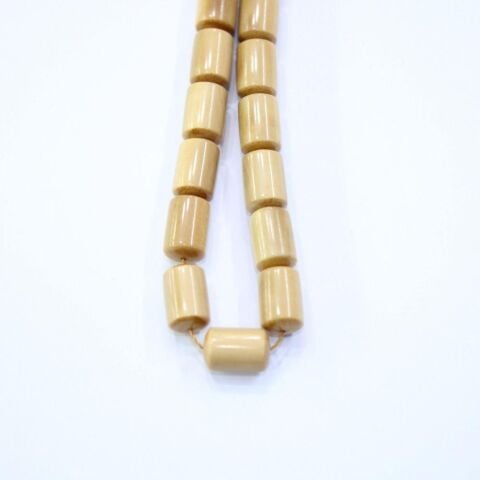 Usta İşçilikli Mamut Dişi Tespih 7*11 (mm)